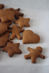 heart shaped cookies, gingerbread cookies, brown cookies on the white background