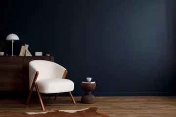 Fotobehang Per kamer Modern living room interior composition with fluffy armchair, wooden commode and modern home accessories. Blue wall. Template. Copy space. Home staging.  © FollowTheFlow