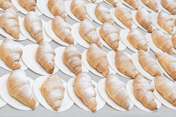 background croissant screensaver, sweet buffet table, breakfast in hotel restaurant