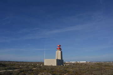 Fototapeta na wymiar Lighthouse near Sagres Fortress