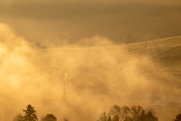 Foggy, autumn morning in the Pieniny Mountains. Light and fog create an amazing mood in the photo.