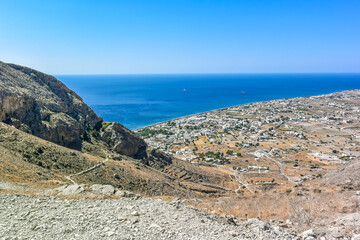Perissa village, aerial view from Messavouno (Mésa Vounó) mountain on Santorini island, Greece.
