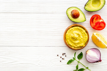 Bowl of guacamole avocado dip. Homemade guacamole cooking