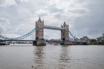 Tower Bridge, famous iconic bascule and suspension bridge, crossing the River Thames in London, England, United Kingdom.
