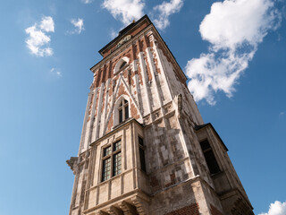 Historic Krakow Town Hall Tower, Wieża Ratuszowa w Krakowie. Main Market Square in the Old Town district of Kraków, Poland. - obrazy, fototapety, plakaty