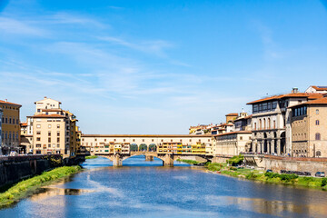 Naklejka premium Ponte Vecchio, old bridge over Arno River, Florence, Tuscany, Italy