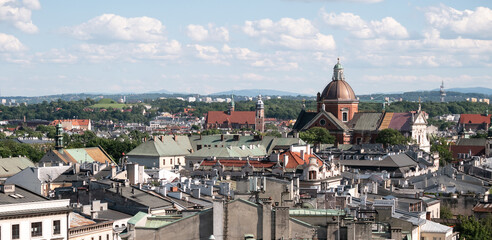 Panoramic scenic view of Kraków, with Saints Peter and Paul Church and Corpus Christi Basilica...