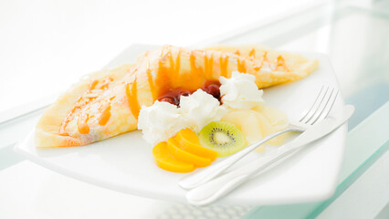 Cake decorated with fresh  on white background. Cafes in Phuket Thailand.