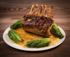 Recipe ribs, pork rib, pork with thyme and braised lettuce. High quality photo