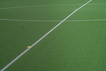 Naklejka premium Partial image of green artificial turf in sports stadium