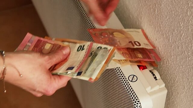 banknotes deposited on a radiator