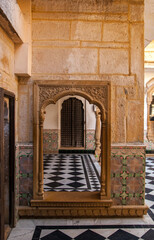 An entrance door of a royal house within Jaisalmer fort, Rajasthan, India.