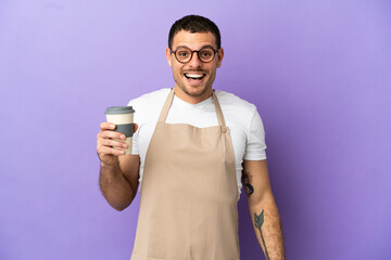 Brazilian restaurant waiter over isolated purple background with surprise facial expression