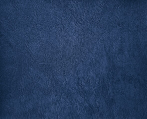 luxury blue faux leather. blue artificial leather background for luxury, elegant and classic concept. plain background of blue leather in close-up view.