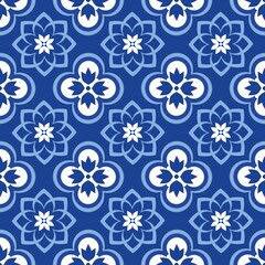 Blue white seamless background with flowers..Abstract, repeating regular pattern for print..Graphic design with regular shapes.