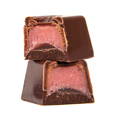 Chocolate candies sweets with pink strawberry filling isolated on the white