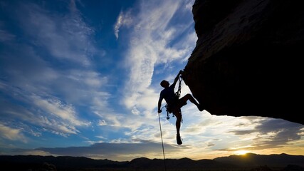 silhouette of a climber