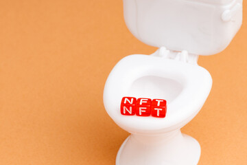 red letters NTF on the edge of the toilet