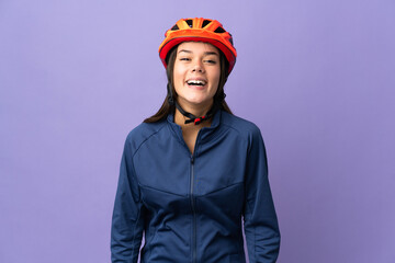Teenager cyclist girl with surprise facial expression - obrazy, fototapety, plakaty