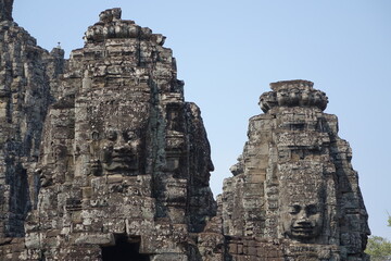 Fototapeta premium Adventure of exploring mystic Bayon temple in the impressive Khmer ruin city Angkor Thom (horizontal image), Siem Reap, Cambodia