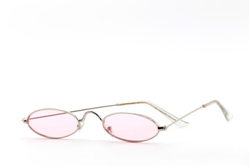 glasses with pink crystals isolated on white background