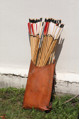 A leather quiver filled with arrows
