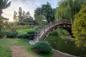 bridge over the river with Japanese temple in background