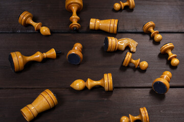 chess pieces on wooden background