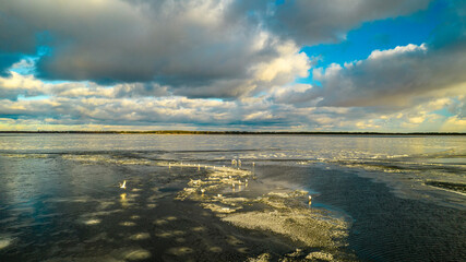 Aerial view of seagulls on a frozen lake