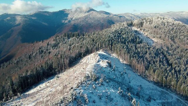 Long relaxing flight above winter mountains. Nature relaxation