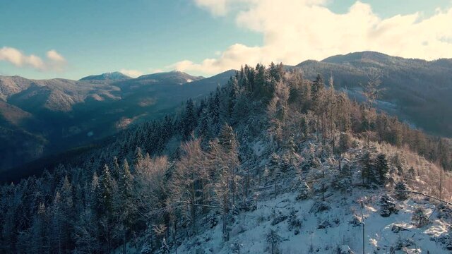 Winter wonderland. Camera rises above the amazing winter mountains. Nature relaxation footage