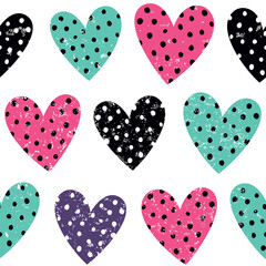 Seamless vector pattern with hearts and polka dots.