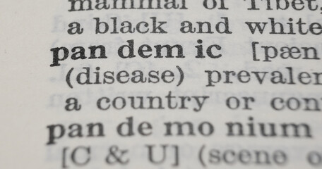 Pandemic dictionary definition close-up. Shallow depth of field.