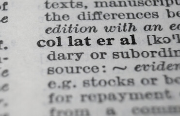 Collateral dictionary definition close-up. Shallow depth of field. - obrazy, fototapety, plakaty