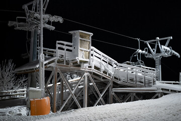 Fototapeta premium snow-covered ski lift 