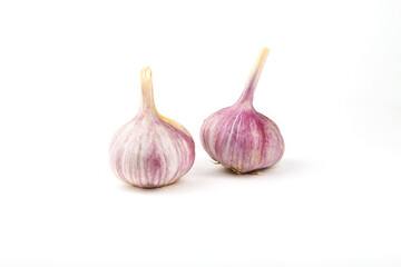 Close-up of garlic on a white background.