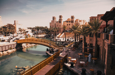 DUBAI, UAE - FEBRUARY 2018: View of the Souk Madinat Jumeirah. Madinat Jumeirah encompasses two hotels and clusters of 29 traditional Arabic houses.