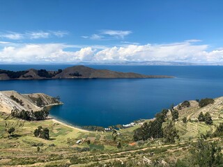 Titicaca lake beautiful Island of Sun Isla del Sol in Bolivia South America. Ancient holy site of Inca. Perfect view Lake Titicaca, Cordillera Real Bolivian side and Peruvian shores. Idyllic nature.