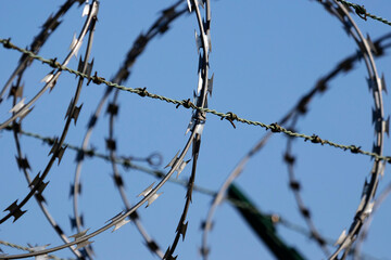 Barbed wire border fence and defense.