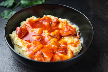 mashed potatoes tomato sauce roast sausage healthy meal food snack on the table copy space food background rustic top view 