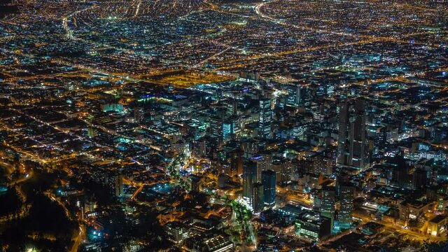 Aerial time lapse view of the Bogota cityscape at night. Bogota is the capital and largest city of Colombia, South America.