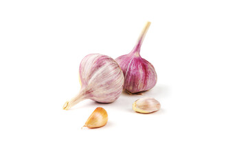 About the benefits of garlic. Two heads of garlic on a white background.