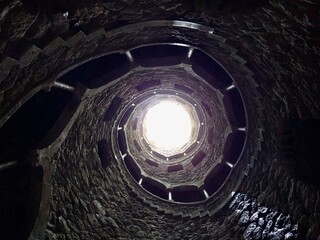 Inverted tower - The Initiation Well of Quinta da Regaleira in the palace park of Sintra