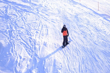 Slope, skier going down the slope