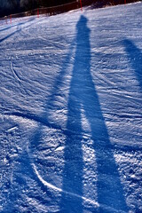 Slope, skier going down the slope