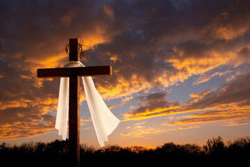 This dramatic sunrise lighting and Easter Cross makes a great Easter photo illustration of Jesus...