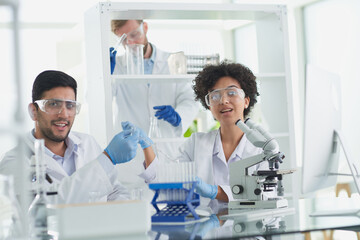 Fototapeta premium Team of Medical Research Scientists Working on Generation Experimental Drug