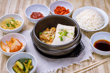 tofu with cabbage korean cuisine on wooden table