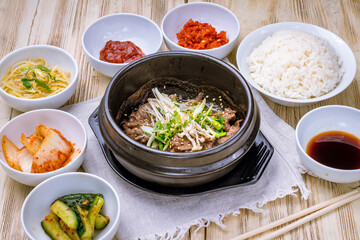 fried beef with spices korean cuisine on wooden table
