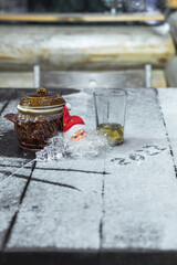 After the celebration of the new year 2022. Outdoor winter party. Santa Claus gets tired too. Year two thousand twenty two. Selective focus.